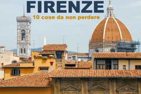 Firenze: 10 cose da non perdere. Veduta del Duomo e del Campanile di Giotto, con tetti in primo piano.