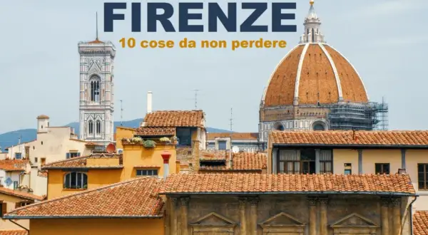 Firenze: 10 cose da non perdere. Veduta del Duomo e del Campanile di Giotto, con tetti in primo piano.