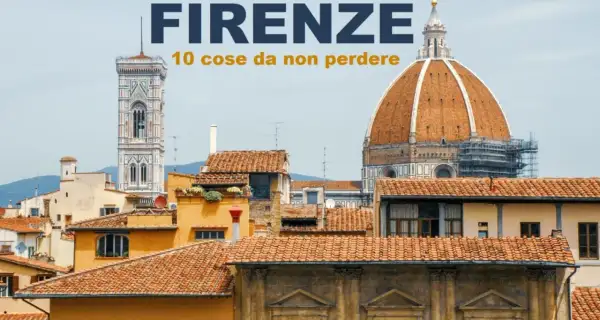 Firenze: 10 cose da non perdere. Veduta del Duomo e del Campanile di Giotto, con tetti in primo piano.